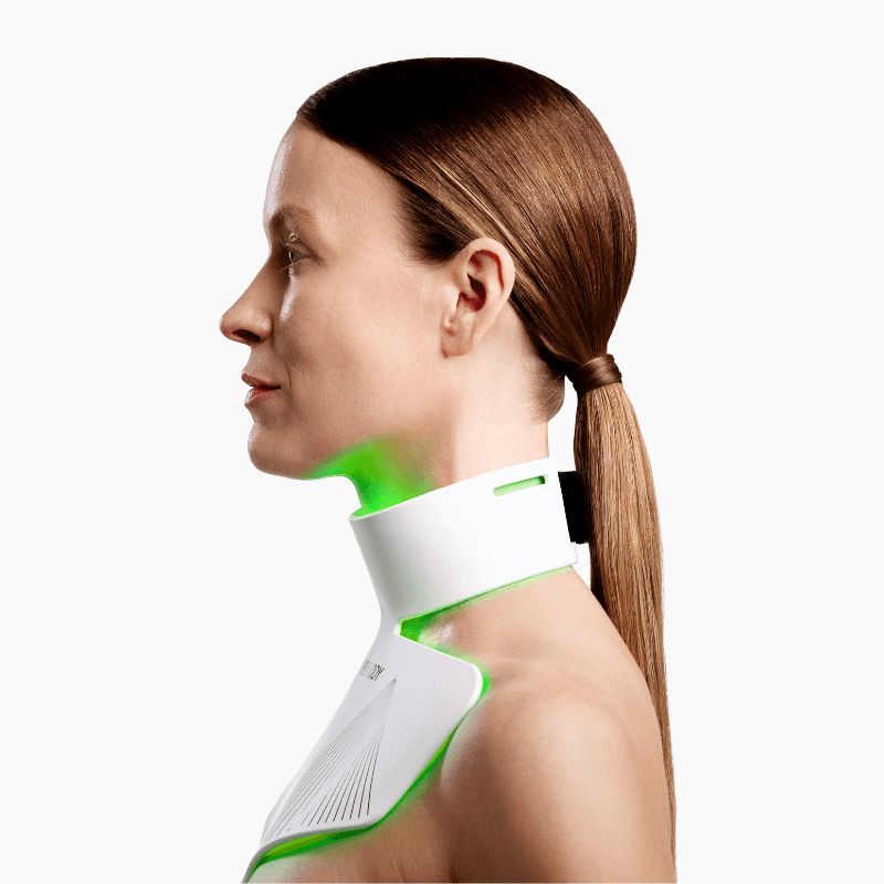 Model wearing the CurrentBody Skin LED Neck and Décolletage Mask